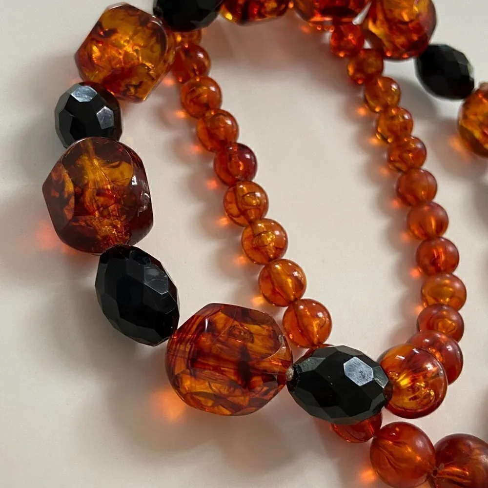 Orange and black beaded necklace